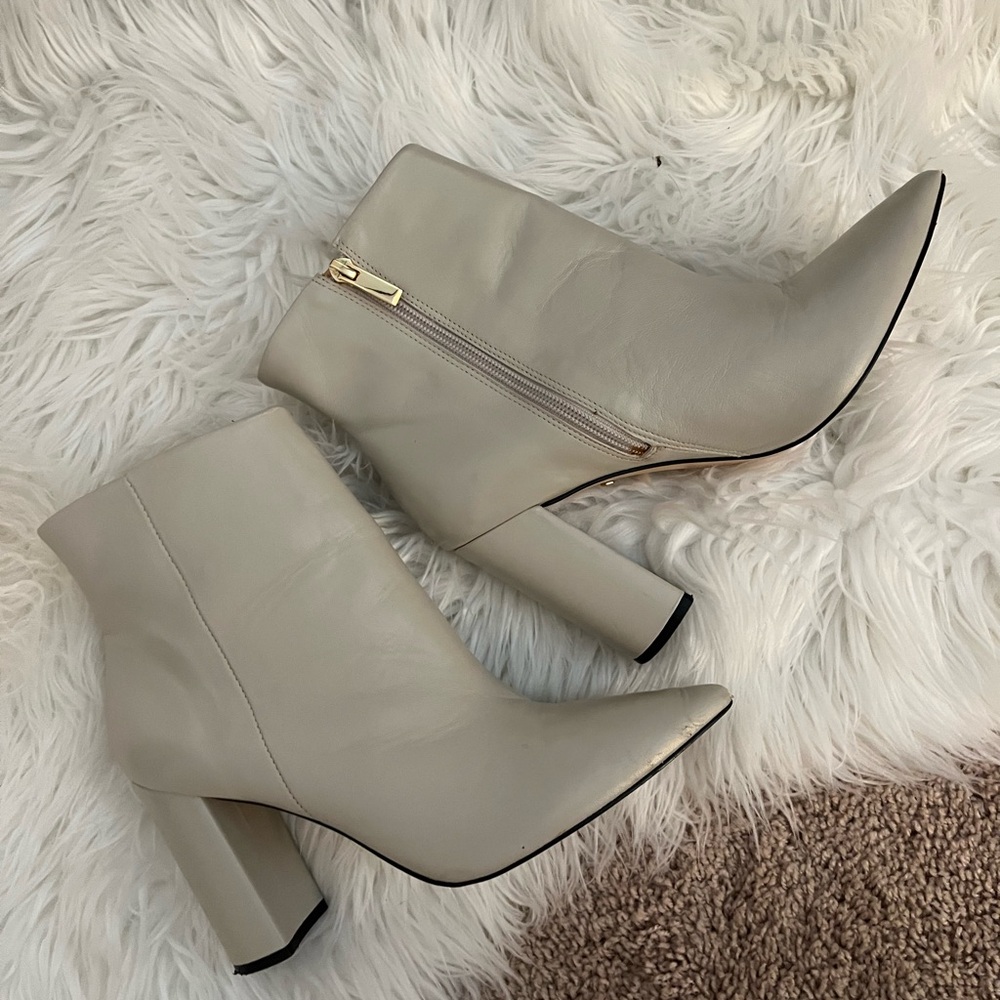 Neutral pointed toe booties